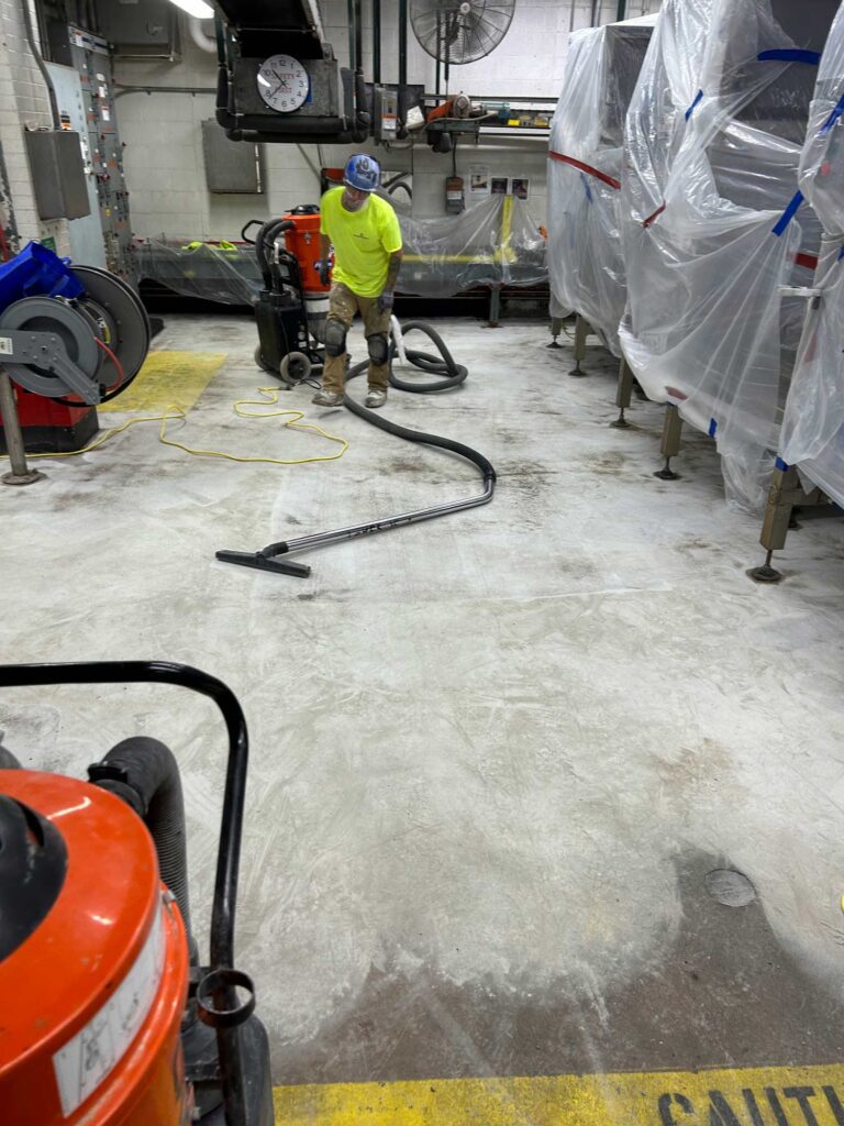 Prep work for epoxy floor at Heinz facility